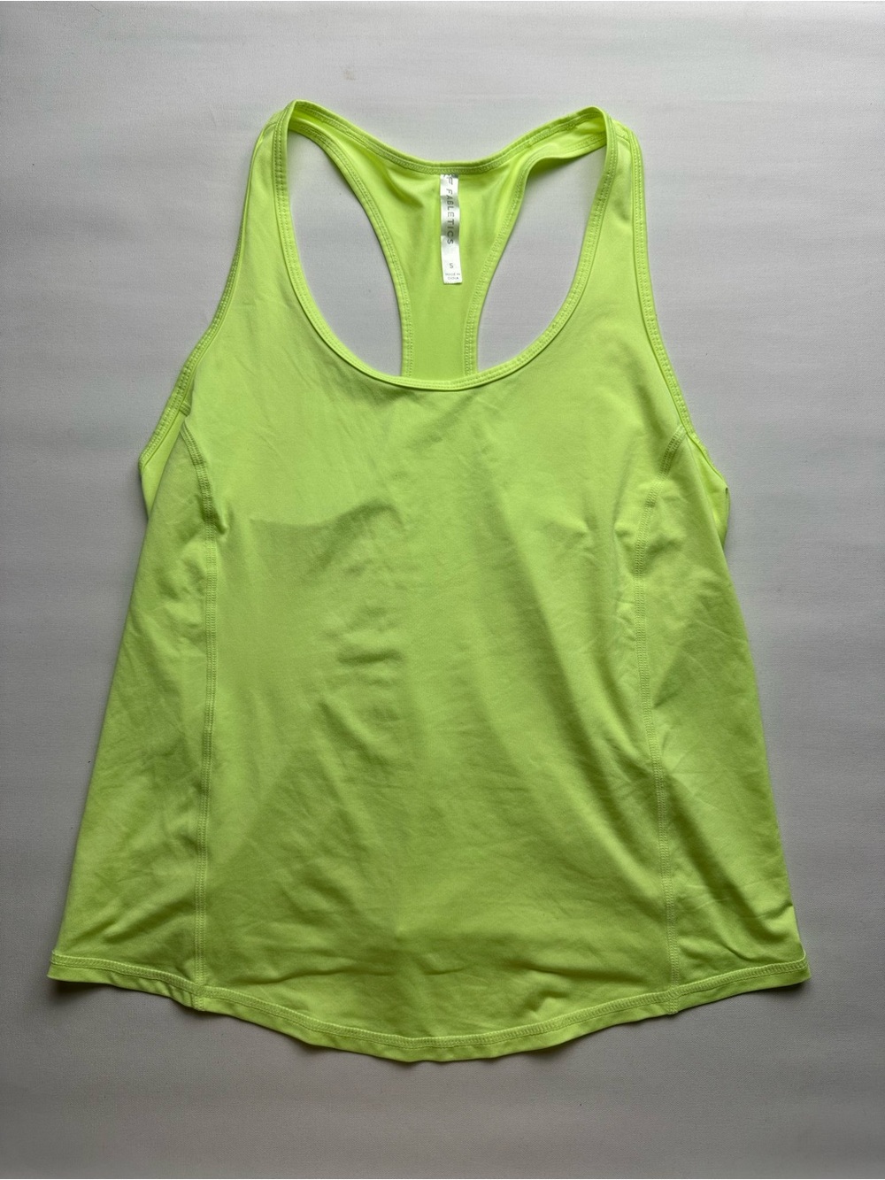 Performance Racerback Tank Top - Neon Yellow. Fabletics. Est Size S